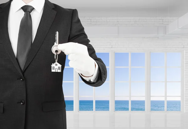 Business gives a key — Stock Photo, Image