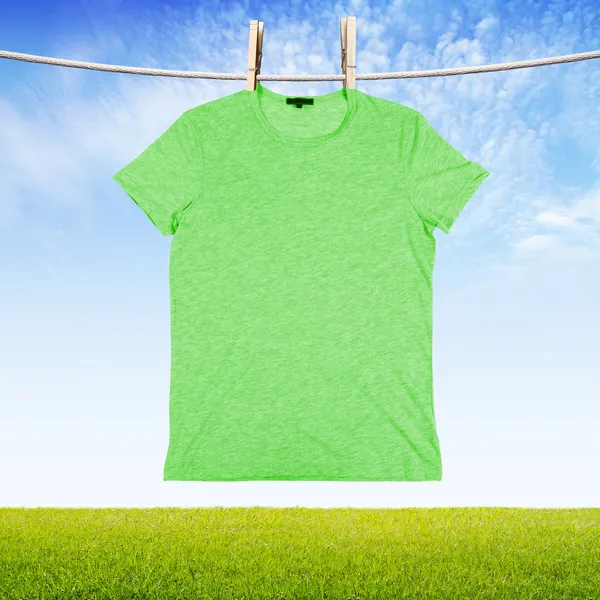 Washing green tshir — Stock Photo, Image