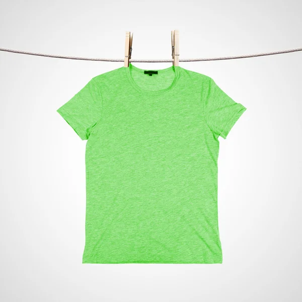 Washing green t-shirt — Stock Photo, Image