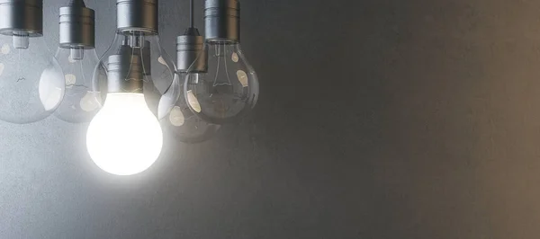 Lampadina Incandescente Sfondo Sfocato Ampio Muro Cemento Idea Innovazione Soluzione — Foto Stock