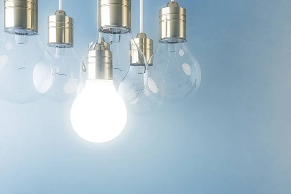 Glödande Glödlampa Suddig Blå Vägg Bakgrund Idé Innovation Lösning Och — Stockfoto