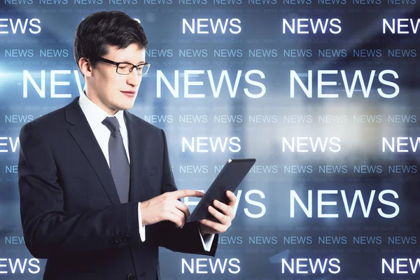 Attractive Young European Businessman Using Tablet Blurry Office Interior Glowing — Stock Photo, Image