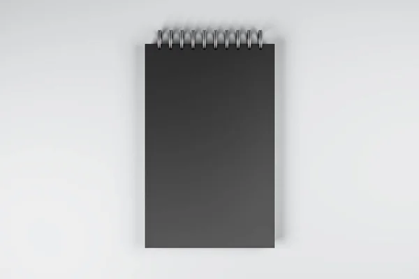 Üst Görünüm Beyaz Masaüstü Arkaplanındaki Siyah Yay Defterini Kapat Reklamınız — Stok fotoğraf