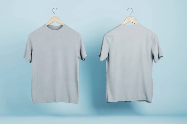 Tomma Grå Shirts Blå Vägg Bakgrund Produktdesign Och Presentation Koncept — Stockfoto