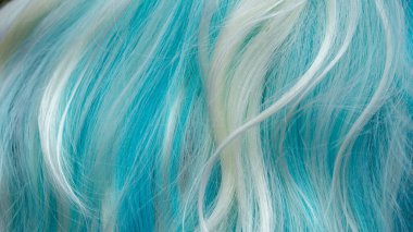 close up of bright female hair texture background 