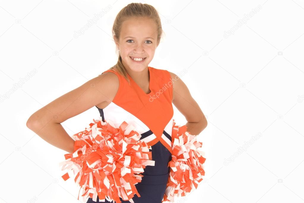 Young girl cheerleader standing with pompoms