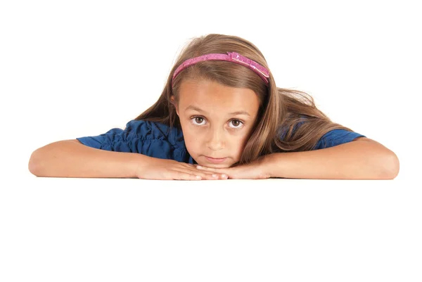 Cute young girl laying on the ground closeup — Stock Photo, Image