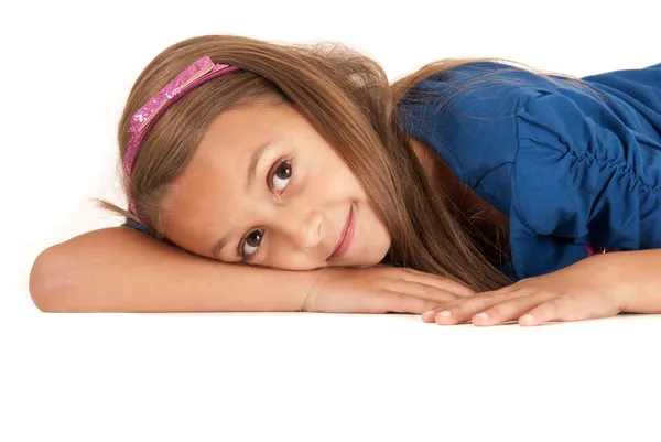 Cute dark complected girl laying on her arm — Stock Photo, Image