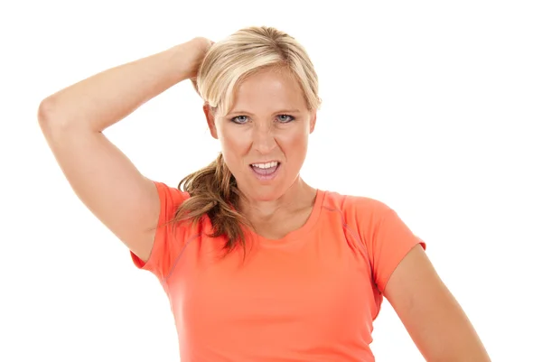 Vrouw in oranje fitness boven weergegeven: een kleine houding — Stockfoto