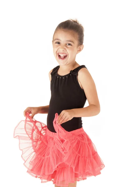 Mladá dívka v růžové sukénce černý trikot šťastný — Stock fotografie