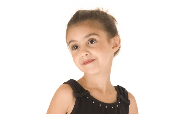 Young girl in black leotard with sparkly eyes head tilted — Stock Photo, Image
