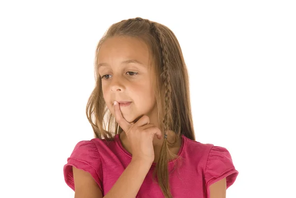 Młoda brunetka z oplotem myślenia w różowej koszuli — Zdjęcie stockowe