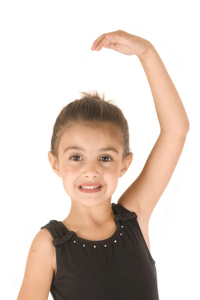 Adorable young girl ballerina posing arm extended up — Stock Photo, Image