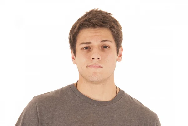 Very casual young man in gray tee shirt with I don't care facial — Stock Photo, Image