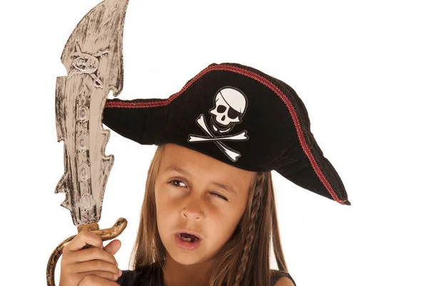 Young brunette girl in pirate's costume with sword and hat Royalty Free Stock Images