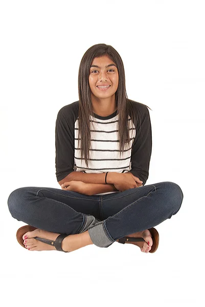 Beautiful Tongan teenage girl sitting with white background — Stock Photo, Image