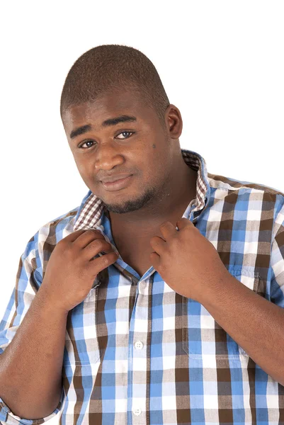 Afrikanska amerikanska ung man stående rutiga skjortan nykter uttryck — Stockfoto