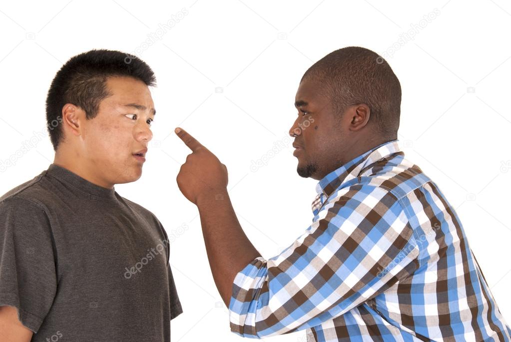 African American Asian brothers having an arguement