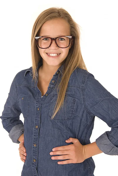 Teenage model in denim shirt and glasses smiling — Stock Photo, Image