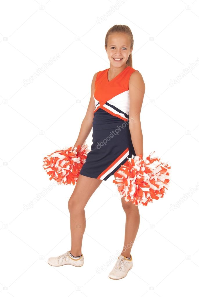 Young high school cheerleader standing with hands at her side p