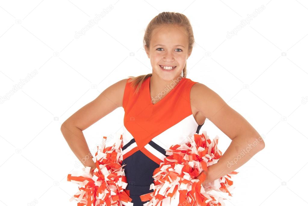 Young high school cheerleader with pom poms from waist up