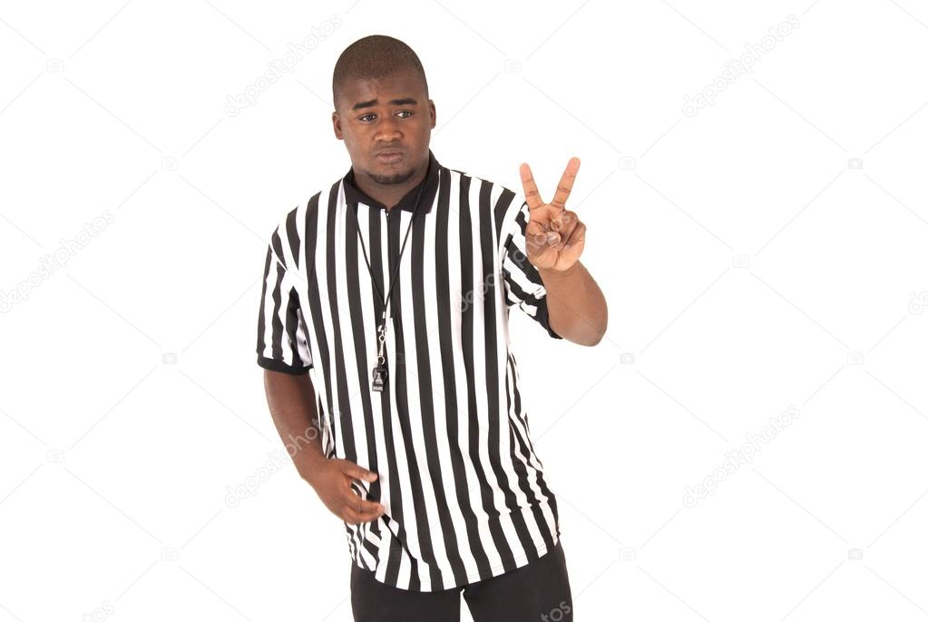 Black referee showing a two shot foul basketball