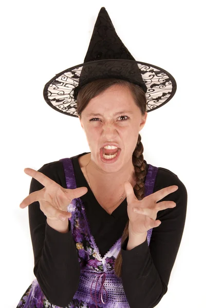 Young woman in black witch's hat funny expression — Stock Photo, Image