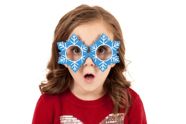 Girl with funny expression in snowman glasses — Stock Photo, Image