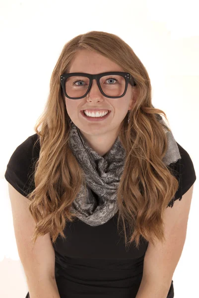 Attractive young woman wearing black glasses smiling — Stock Photo, Image