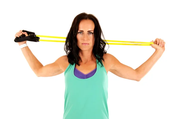 Attraktiv kvinnlig modell under en arm styrka träning — Stockfoto