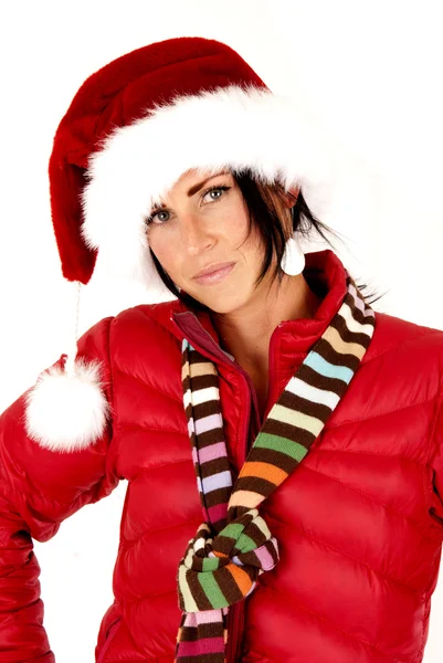 Attractive female model wearing a santa hat with serious look — Stock Photo, Image