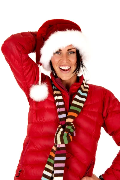 Woman model in santa hat and red coat — Stock Photo, Image