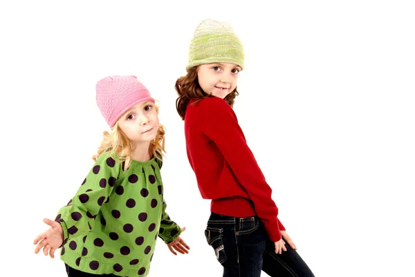 Two girls in winter hats with fun expression — Stock Photo, Image