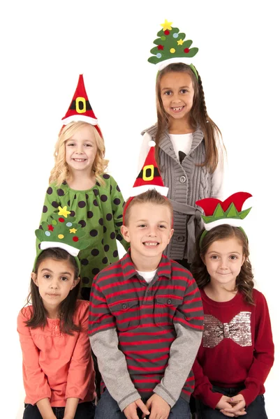 Cinq jeunes enfants en drôle bandeaux de Noël souriant — Photo
