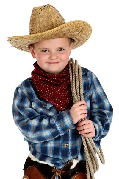 Adorable young boy wearing cowboy hat holding rope — Stock Photo, Image