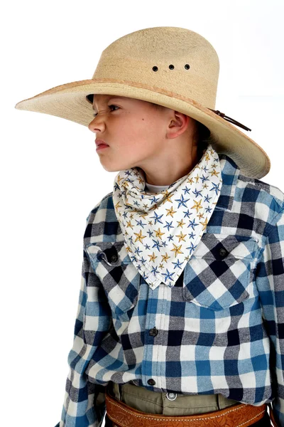 Jeune cow-boy avec une expression de ricanement portant un énorme cow-boy ha — Photo