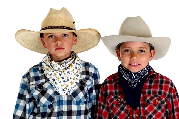 Portrait of two cowboys wearing big hats closeup — Stock Photo, Image