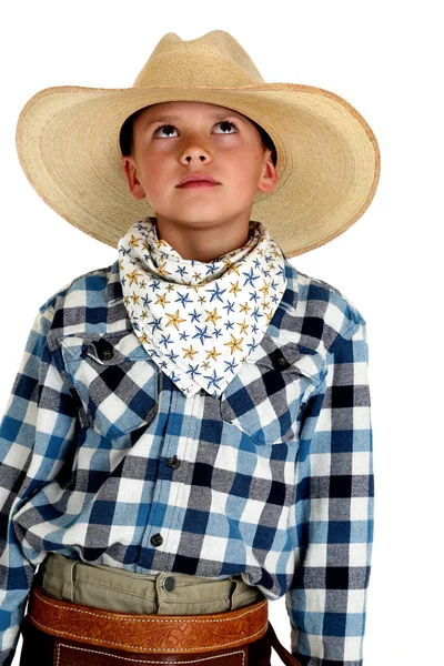 Jovem cowboy vestindo um grande chapéu olhando para cima — Fotografia de Stock