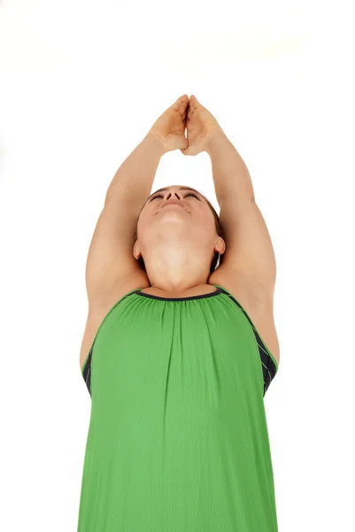 Young yoga instructor in the Warrior 1 pose — Stock Photo, Image