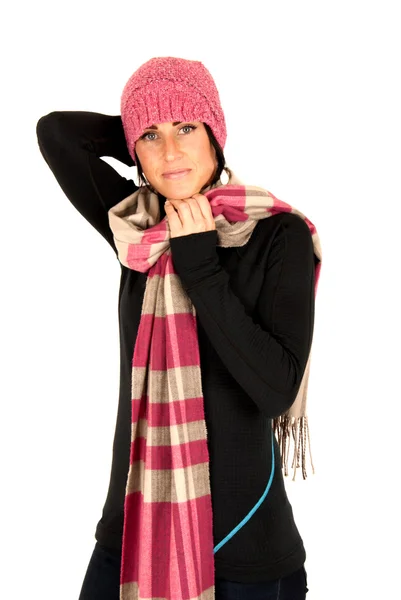 Attractive female wearing pink hat and holding scarf around neck — Stock Photo, Image