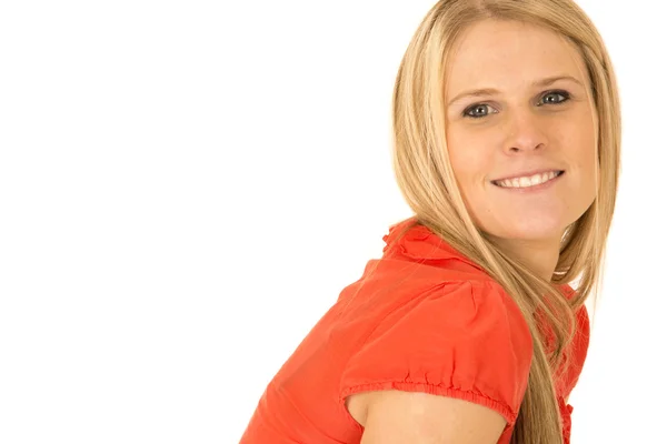 Attractive blond woman smiling with extra white background to he — Stock Photo, Image