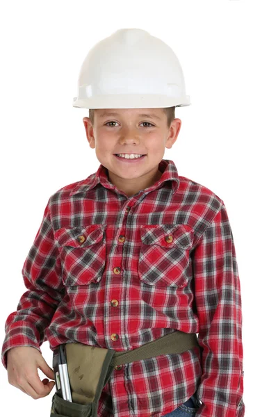 Joven niño en una construcción hardhat sonriendo —  Fotos de Stock