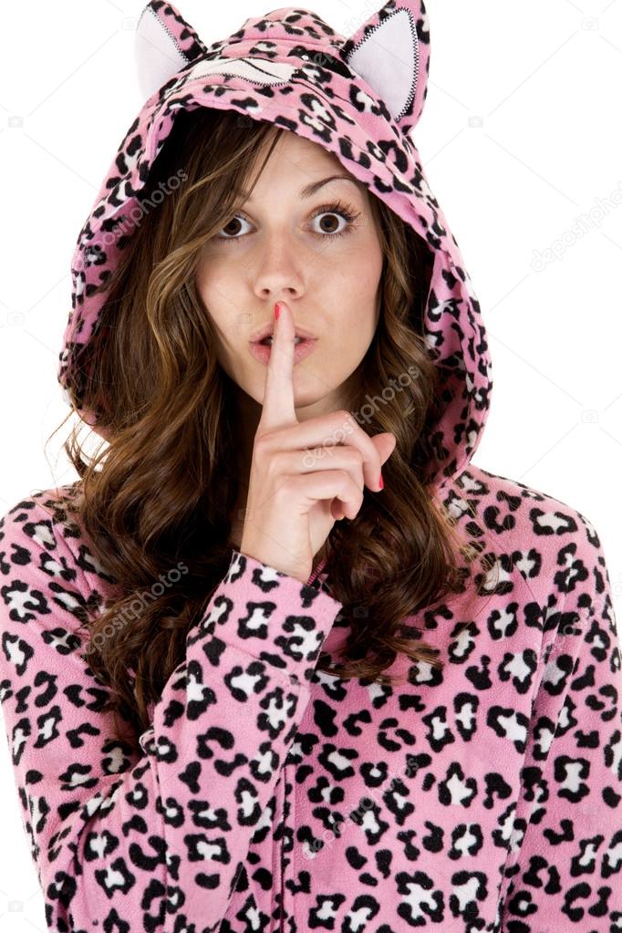 female model in cat pajamas finger to her mouth