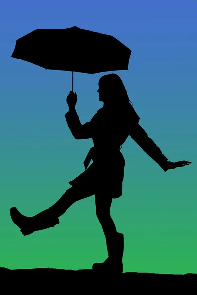 Silhouette of a woman walking with an umbrella blue and green ba — Stock Photo, Image
