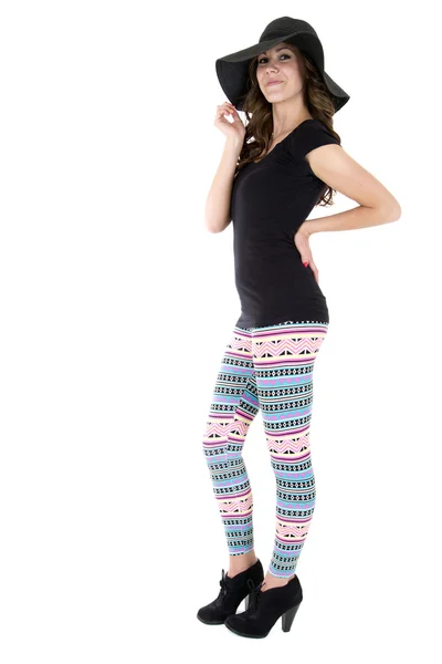 Sexy female model wearing black to and colorful leggings — Stock Photo, Image