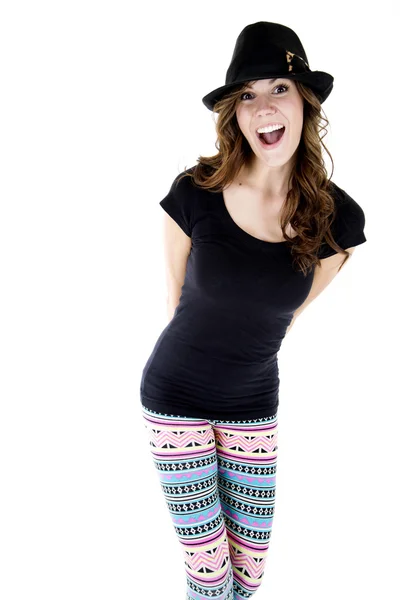 Ženský model s vtipným výraz nosí barevné legíny — Stock fotografie