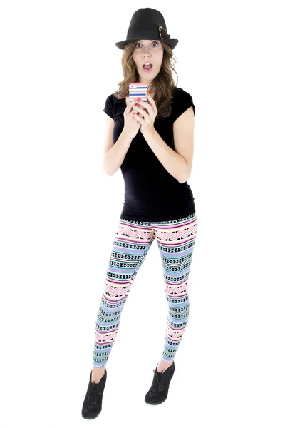 Female model wearing colorful leggings texting with fun expressi — Stock Photo, Image