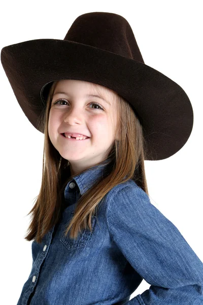 Söt ung cowgirl saknade hennes framtänder leende — Stockfoto
