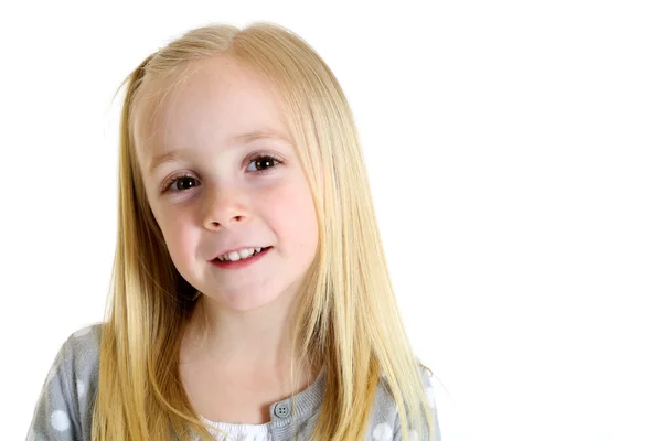 Cute blond girl with brown eyes and an endearing expression — Stock Photo, Image