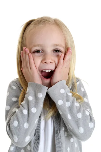 Cute girl with a shocked or surprised expression her hands to he — Stock Photo, Image